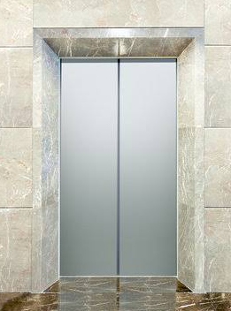 Marble-framed elevator door